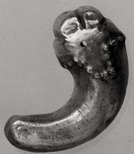 Comma-shaped ornament