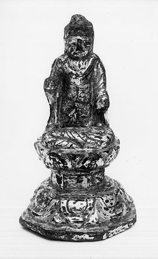 Statuette of Buddha Sitting on Engraved Throne