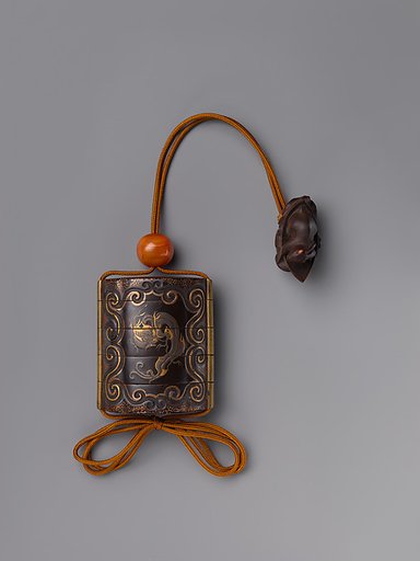 Inrō with Dragon in Cartouche on Arabesque Foliage (Karakusa) Background