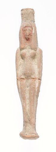 Standing female figurine with tall headdress