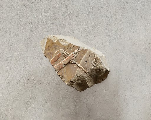 Relief from the tomb of Queen Neferu: female attendant carrying a sunshade (see 26.3.353-1)