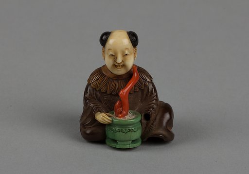 Netsuke of Seated Man with a Flower Pot