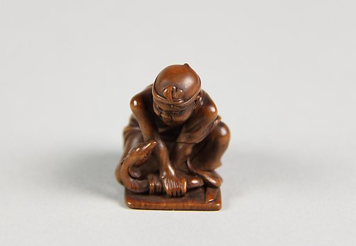 Netsuke of Boy with a Snake
