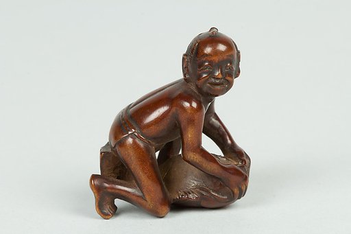 Netsuke of Boy on a Carp