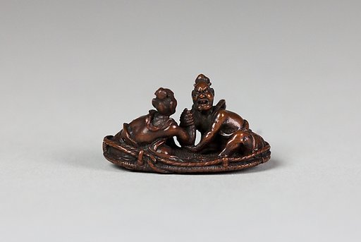 Netsuke of Two Figures Arm-Wrestling