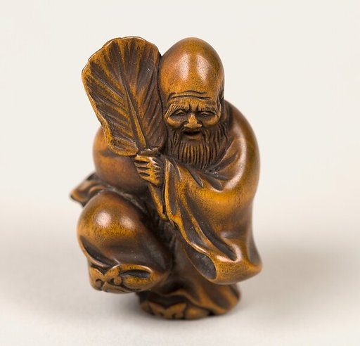 Netsuke of Old Man with a Fan