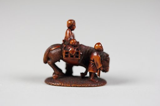 Netsuke of Figures with Horse