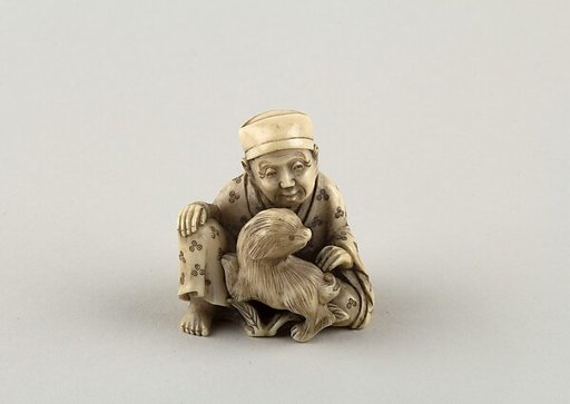 Seated figure of a Man with Dog