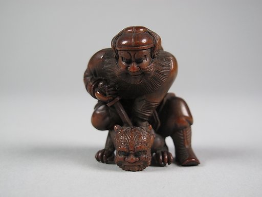 Figure of a Man Killing a Demon