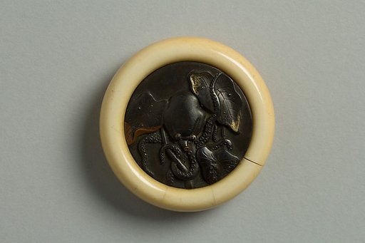 Netsuke Decorated with an Octopus in Lotus Leaves