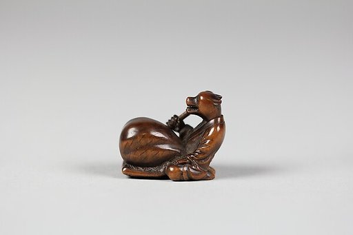 Netsuke: Tanuki no Hara Tsutsumi