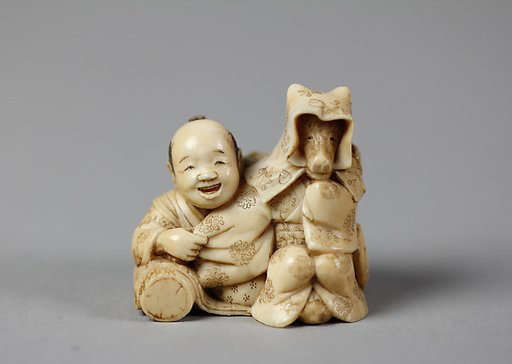 Netsuke of Tokutaro and Fox, Disguised as Woman
