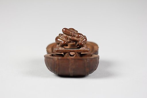 Netsuke of Bale of Rice; Inside are Daikoku and Fukurukujin, Wrestling