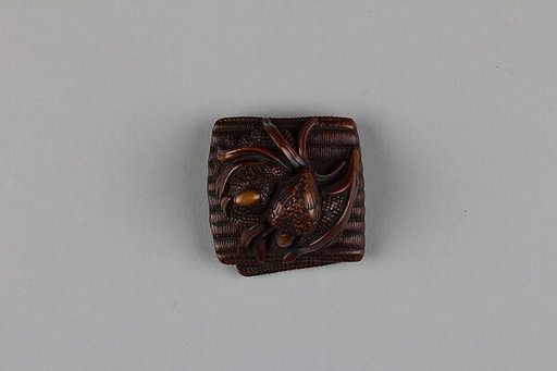 Netsuke of Quail on a Nest of Millet on Matting