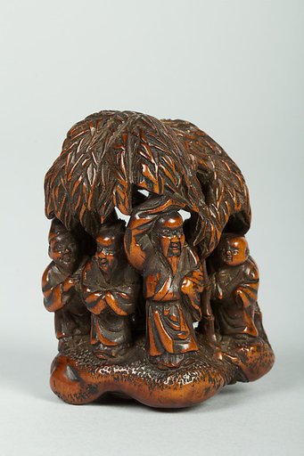 Netsuke of Figures Under a Bamboo Tree