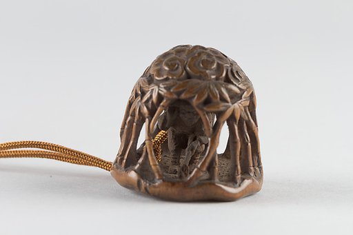 Netsuke of man in a bamboo grove