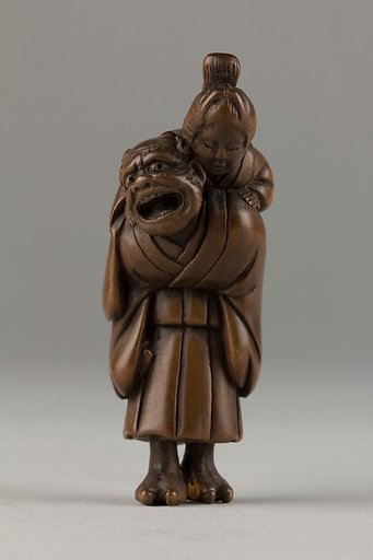 Netsuke of Demon Carrying a Woman on His Shoulders