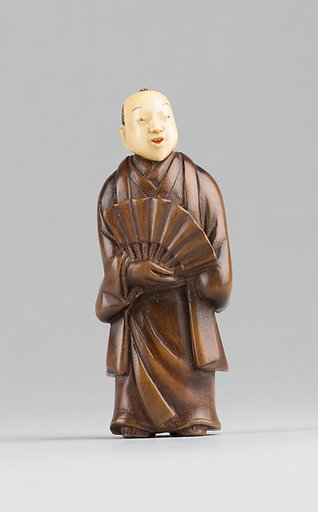 Netsuke of Figure with an Ivory Head