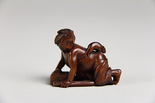 Netsuke of Girl with a Mouse on her Back
