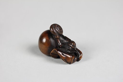 Netsuke of Snail on Eggplant