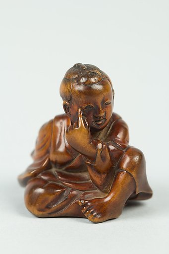 Netsuke of Boy with a Mask