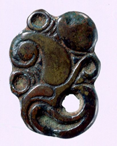 Garment Plaque in the Shape of a Raptor's Head