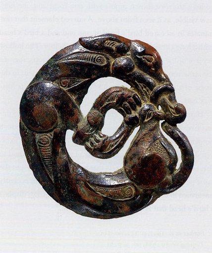 Harness Ornament in the Shape of a Coiled Wolf
