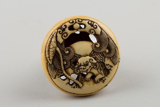 Netsuke Carved with Shishi; reverse with Lotus Leaf