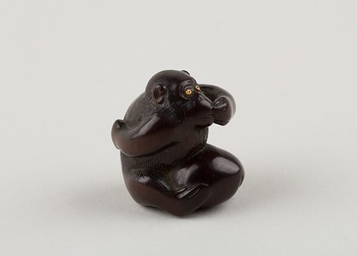 Netsuke of Monkey with One Hand over Mouth, the Other Behind His Back