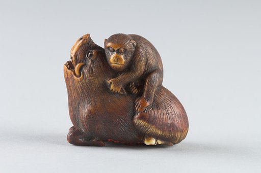 Netsuke of Monkey Attacking a Boar