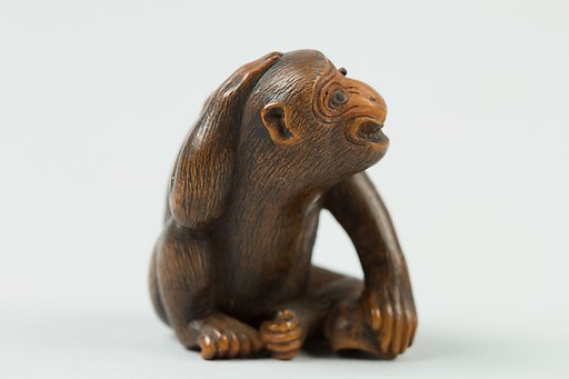 Netsuke of Monkey with a Bee on His Back