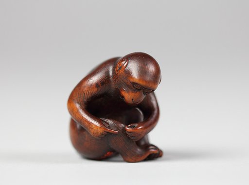 Netsuke of Monkey Catching Fleas