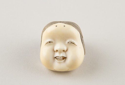 Netsuke of Kyōgen Mask; Usume (or Okama or Ofuku)