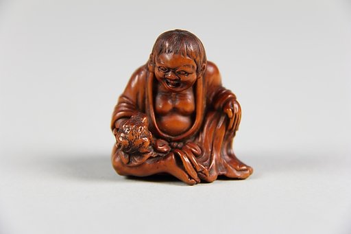 Netsuke of Old Woman with a Toad in her Hand (Gama Sennin)