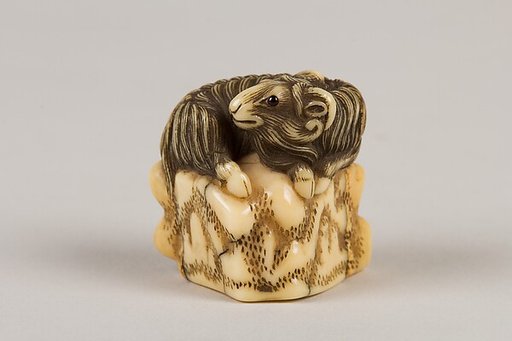 Netsuke of Goat on a Rock