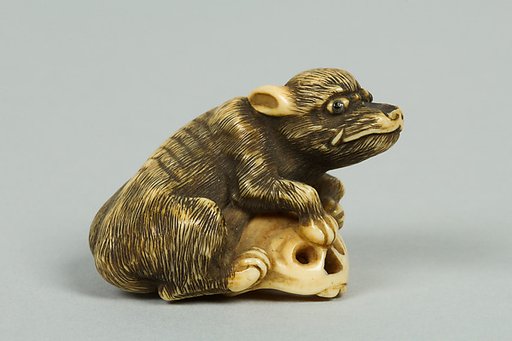 Netsuke of Boar with a Human Skull