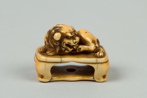 Netsuke of Lion on a Stand