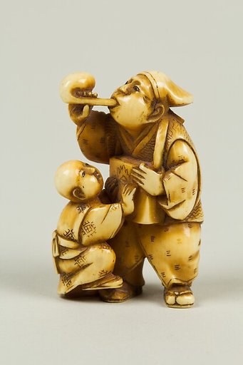 Netsuke of Man and Child