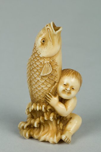 Netsuke of Child with a Carp