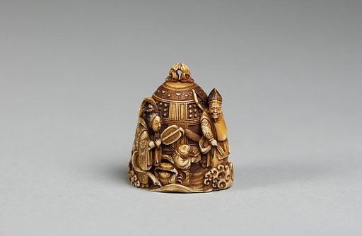 Netsuke in the form of a Bell Ornamented with Waves and Figures