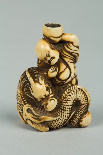 Netsuke of Man and Dragon