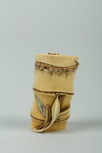 Netsuke of Piece of Bamboo Containing a Rat (or Bat (?)