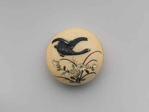 Netsuke of Flying Goose over Flowers