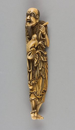 Netsuke of Man Carrying a Frog in One Hand and a Branch in the Other