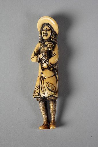 Netsuke of Dutchman Holding a Cock in His Arms