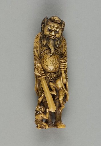 Netsuke of a Man and Two Demons