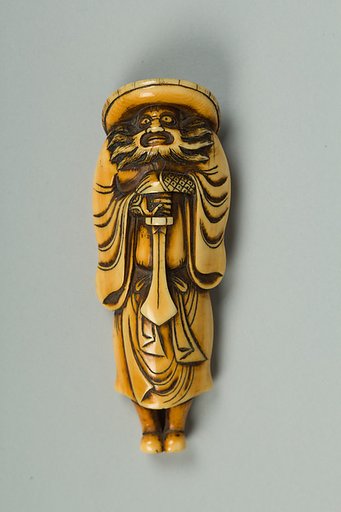 Netsuke of a Man Carrying a Sword
