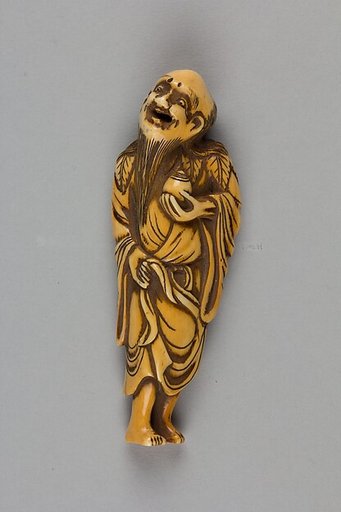 Netsuke of Man with Long Beard Carrying a Vase