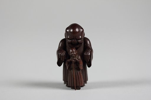 Netsuke of Ghost Trying in Vain to Frighten Blind Man