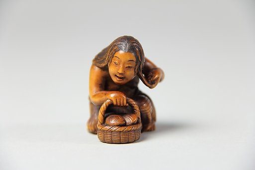 Netsuke of Woman with a Basket of Clams